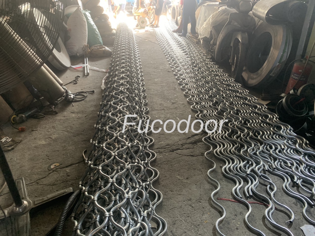  Báo giá cửa cuốn mắc võng, cửa cuốn mắt cáo Fucodoor