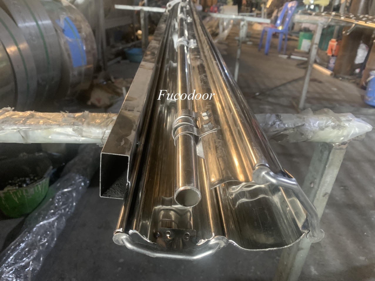 Cửa cuốn song ngang INOX ống tròn phi 19 INOX 201